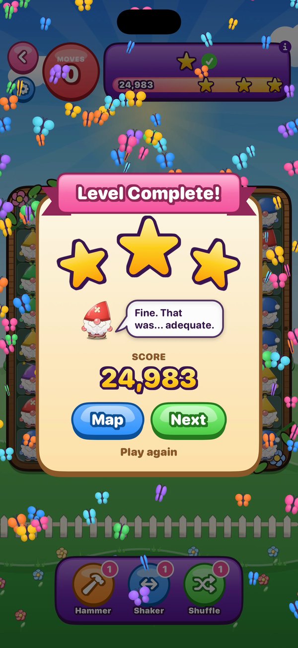 A Gnome Swap level complete screen with three gold stars and butterfly confetti